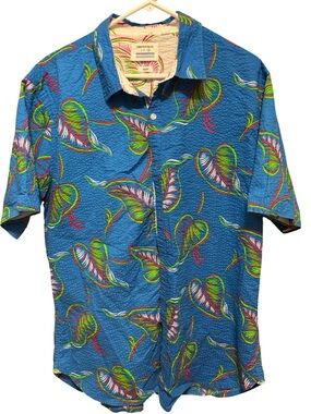 This tropical button-down shirt is‎ from the brand Paper Denim & Cloth.